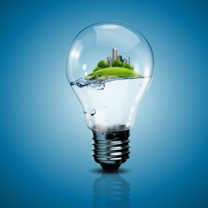 Green Energy Lightbulb With City